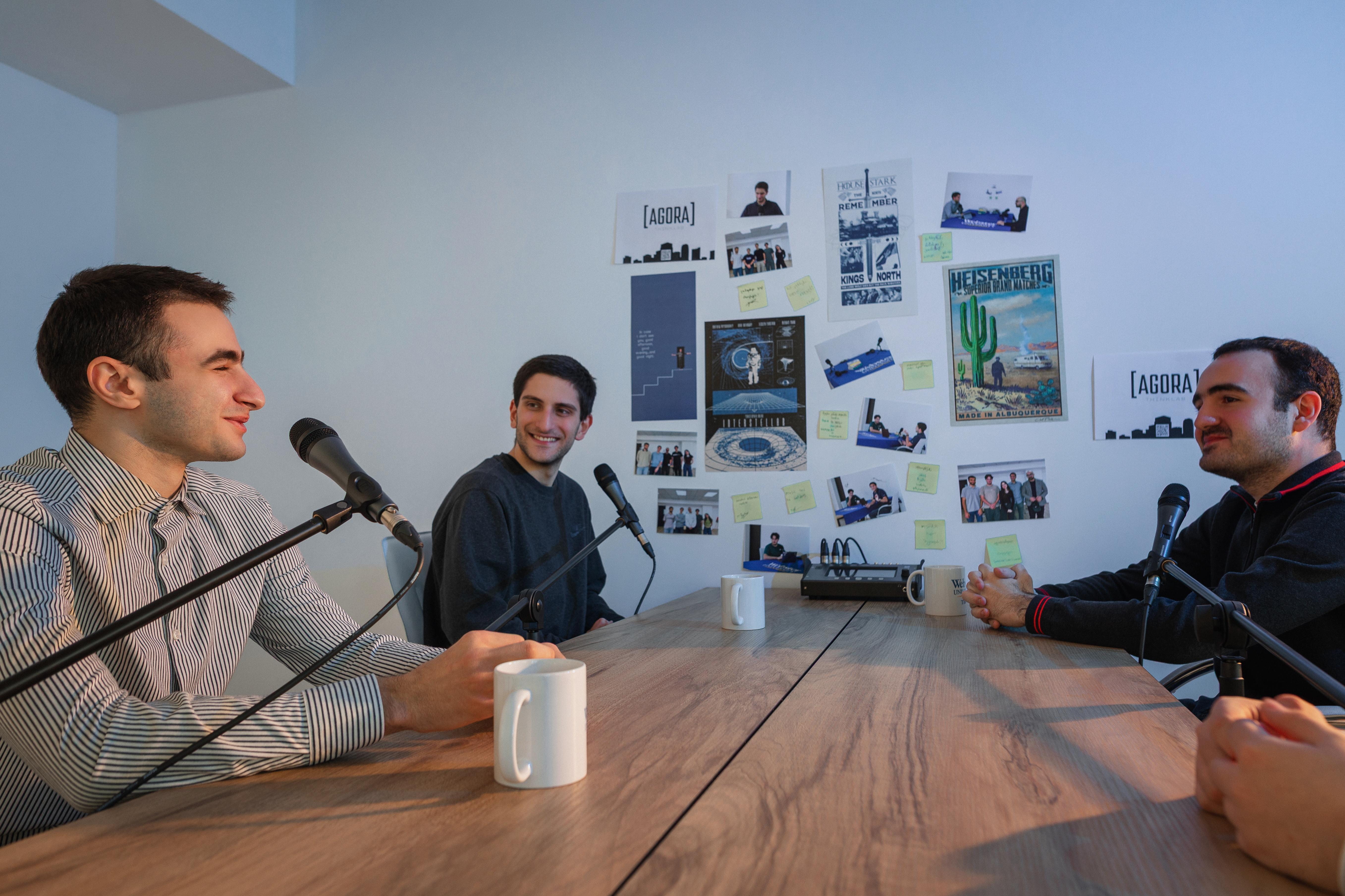 Three students talk on radio at the Tbilisi campus. 